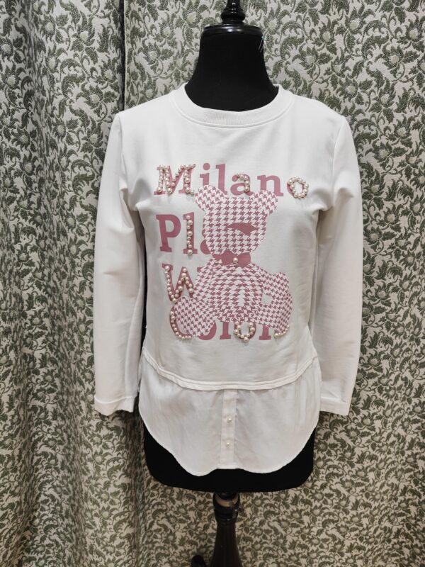 Jersey con falsa camisa. Blanca con detalles en rosa.