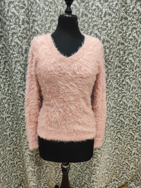 Jersey de pelito rosa.