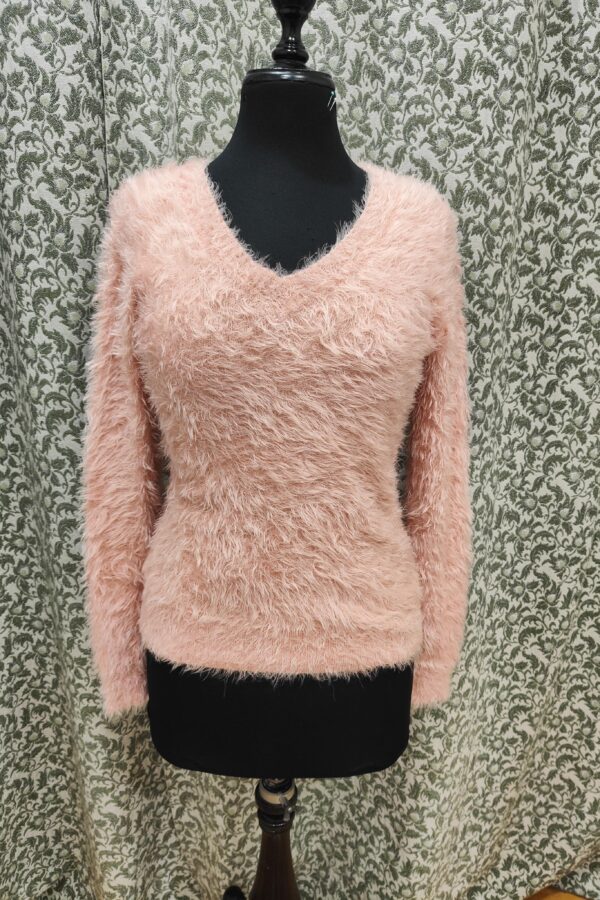 Jersey de pelito rosa.